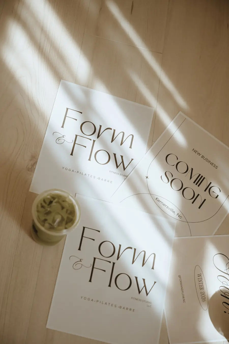 Form & Flow studio signage laid out in morning light